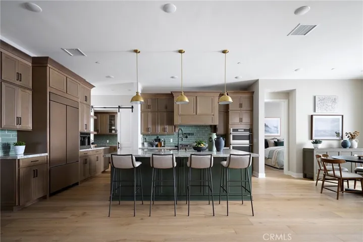 Model Photos: Photos shown are of the model home for this floor plan. Actual finishes, features, and landscaping may vary.