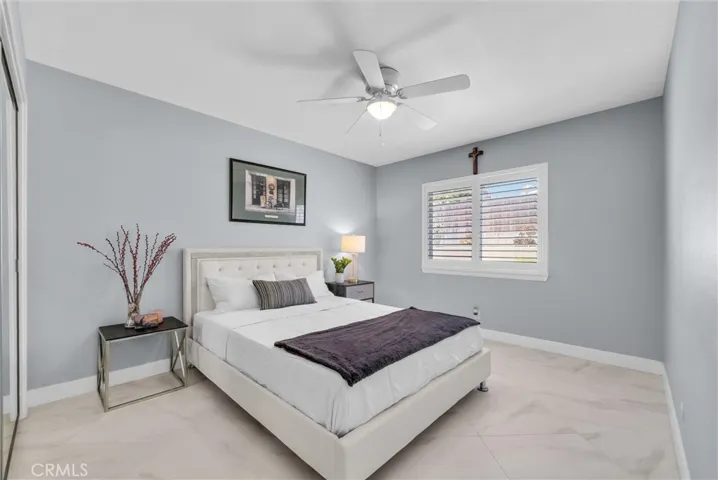 Bedroom 2 of 4 shown.  All bedrooms have ceiling fans.
