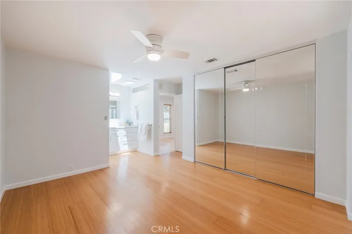 The Primary Bedroom features a Skylight in the Vanity area providing lots of natural light.