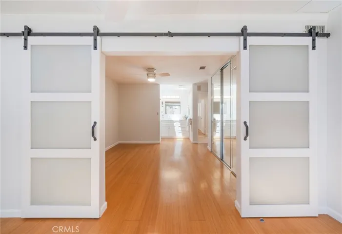 The Custom Barn Doors add Privacy if needed or can be opened to the Primary Suite.