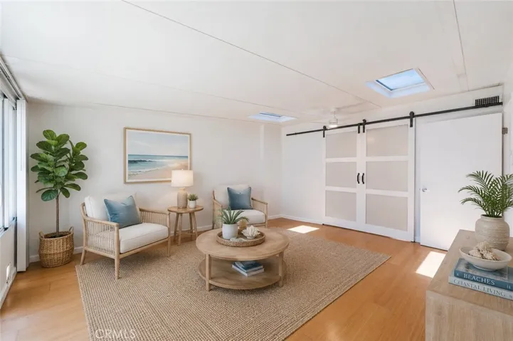 Virtually Staged Bonus/Flex Room as an additional Sitting Area Living Space.