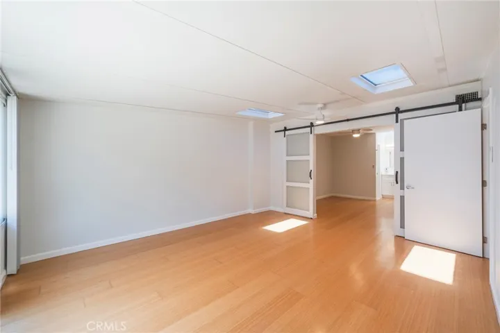 The Bonus/Flex Room can be opened to the Primary Suite or it can be closed off with Custom Barn Doors for Privacy.