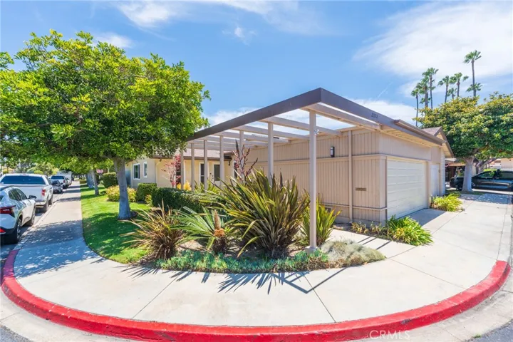Corner Unit with only one attached wall and 2 Car Garage.