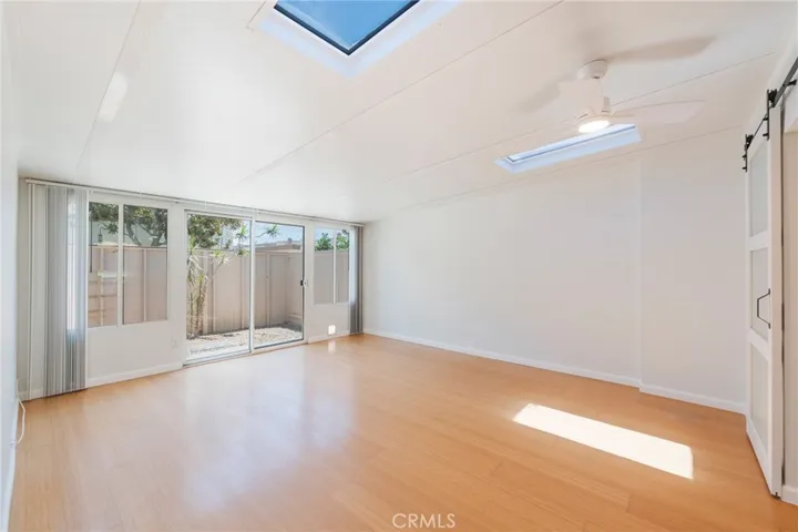 The Bonus/Flex room offers Sliding Glass doors that lead to a Private Enclosed Patio.