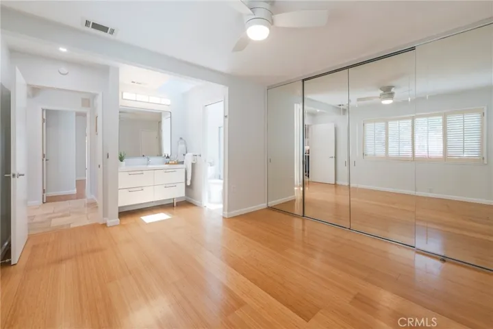 The Secondary Bedroom features its own En-Suite Bathroom and a Huge Wall of Closet Space.