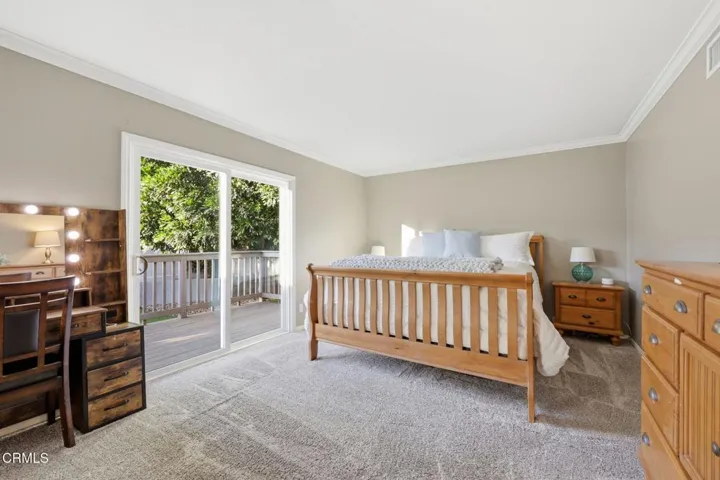 Primary Bedroom with Deck to Backyard