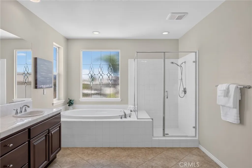 Primary Bathroom with Separate Tub and Shower