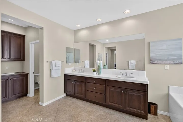 Primary Bathroom showing Dual Vanities