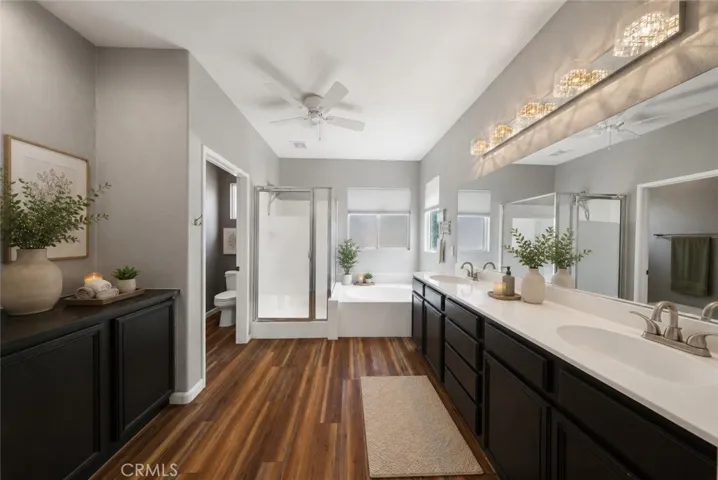 Luxurious Primary Bathroom With Dual Vanities, Soaking Tub, And Walk-In Shower - Digitally Staged