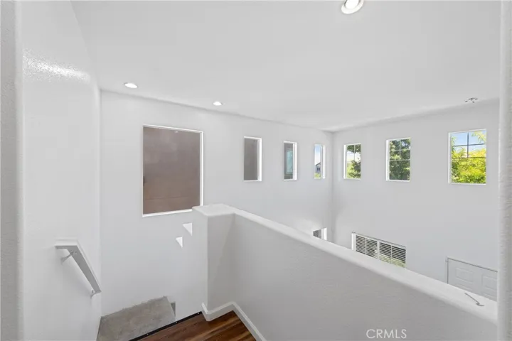 Bright And Airy Upstairs Landing With Views Of The Main Living Area Below