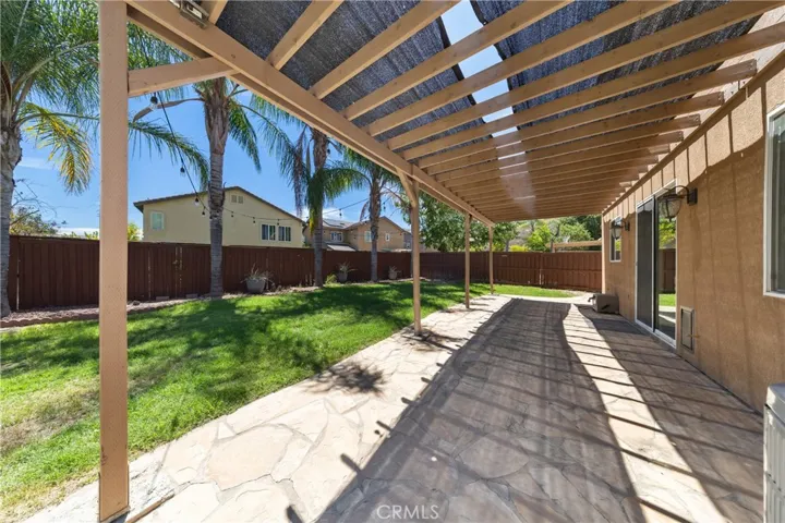 Large Patio Cover Offering Year-Round Outdoor Enjoyment