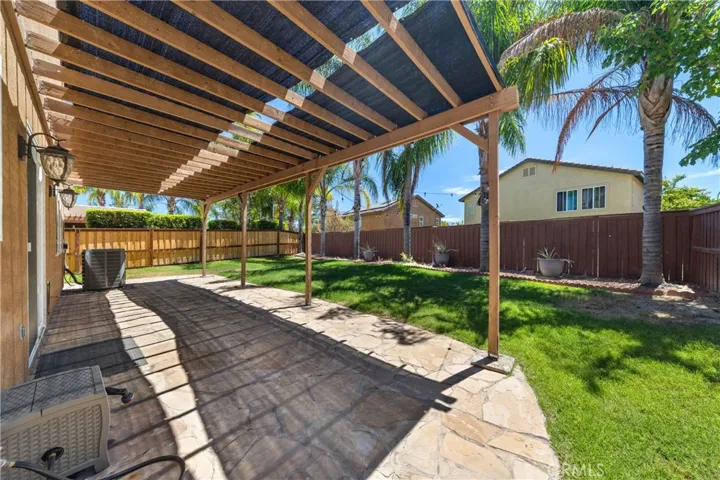 Spacious Covered Patio Perfect For Outdoor Dining And Entertaining