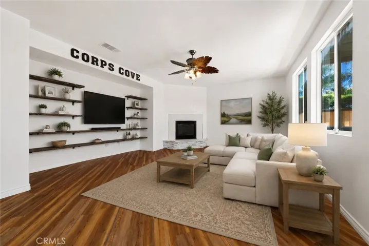 Spacious Family Room Open To The Kitchen, Ideal For Entertaining Guests - Digitally Staged