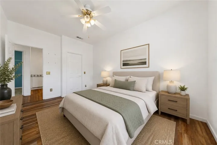 Generously Sized Secondary Bedroom With Ample Closet Space - Digitally Staged
