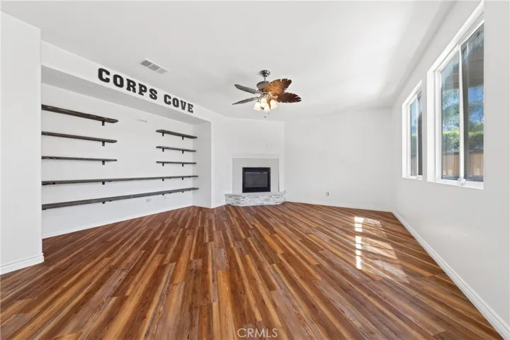 Spacious Family Room Open To The Kitchen, Ideal For Entertaining Guests