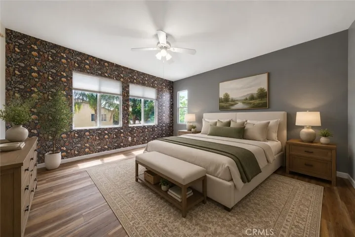 Spacious Primary Bedroom Featuring Custom Accent Wall And Ceiling Fan - Digitally Staged
