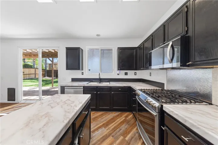 Beautiful Kitchen With Modern Cabinetry And Spacious Island