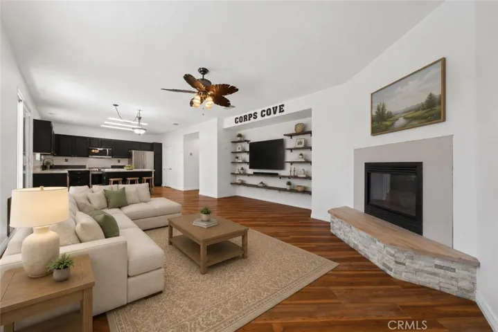 Spacious Family Room Open To The Kitchen, Ideal For Entertaining Guests - Digitally Staged