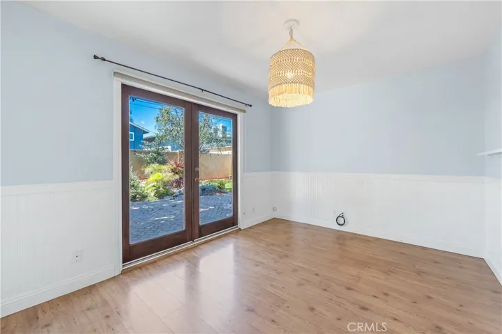 Bedroom #2 with a slider to the beautiful backyard.