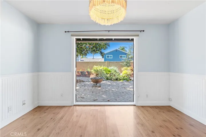 Bedroom #2 with a slider to the beautiful backyard.