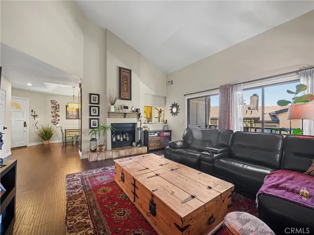 Living room with wood burning fireplace