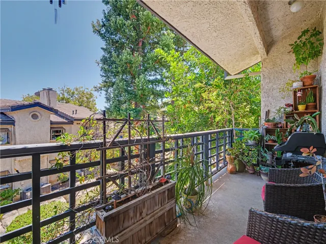 Balcony overlooking waterfall feature