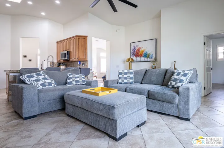 TV room open to kitchen