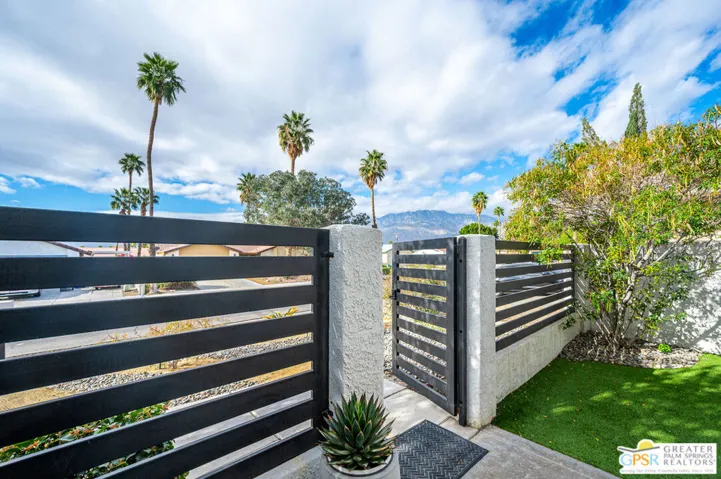 gated entry to courtyard
