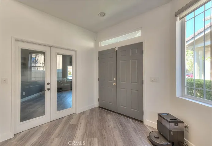 Double door entry to home, double door entry to den/office or optional downstairs bedroom