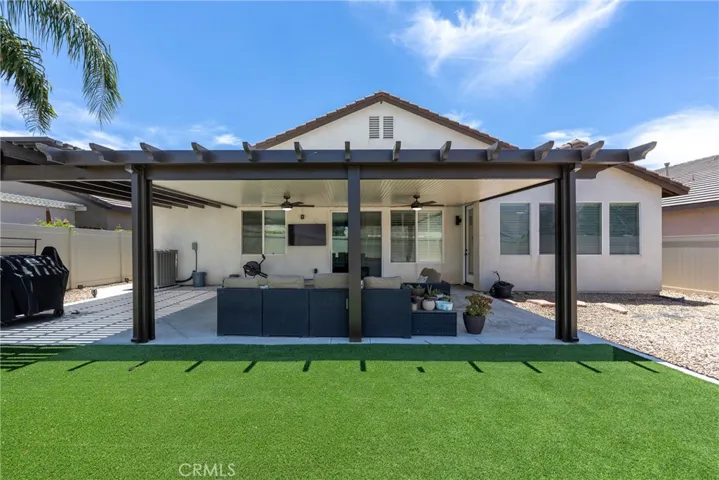 View of Back of house including Artificial Turf