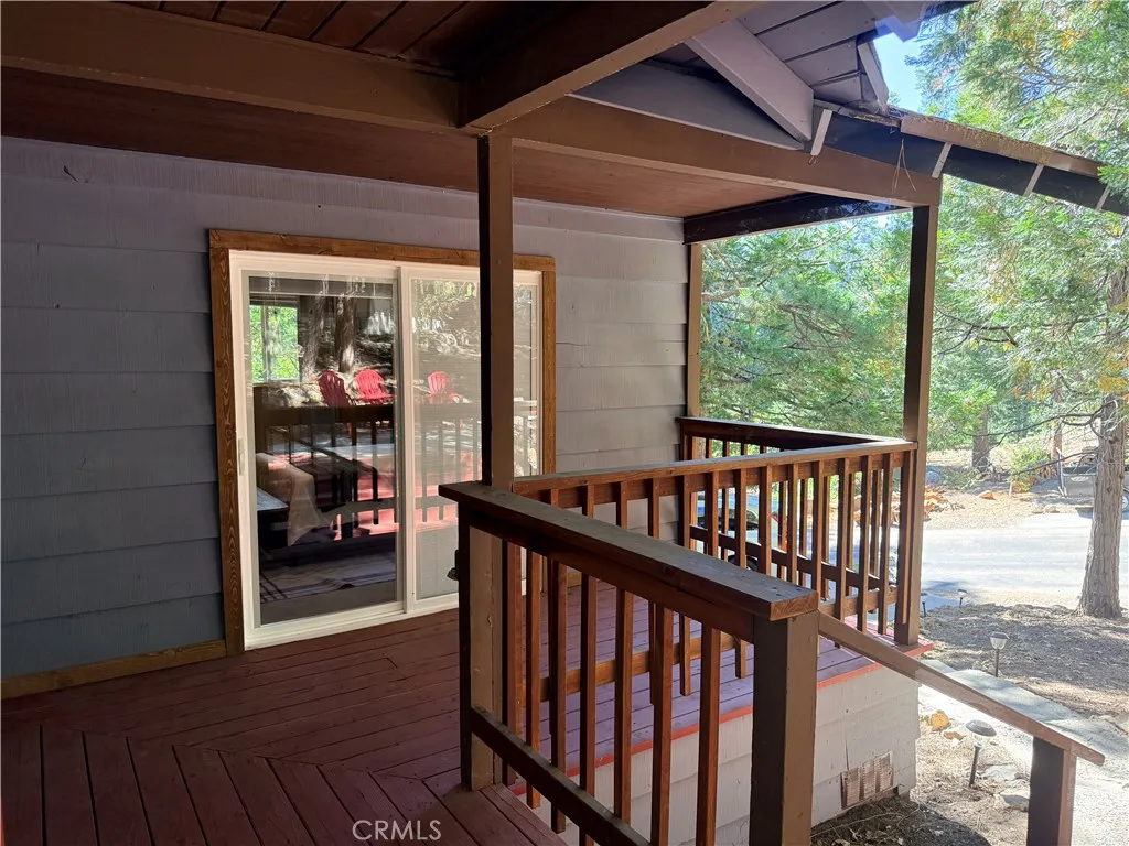 Porch with Sliding Door to Primary Bedroom