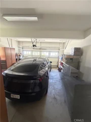 Garage - Image digitally enhanced with AI to remove the seller's personal items for privacy.