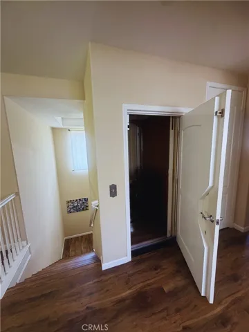 Elevator - Image digitally enhanced with AI to remove the seller's personal items for privacy.