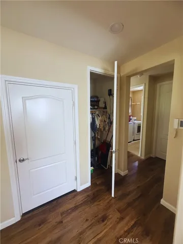 Closet - Image digitally enhanced with AI to remove the seller's personal items for privacy.
