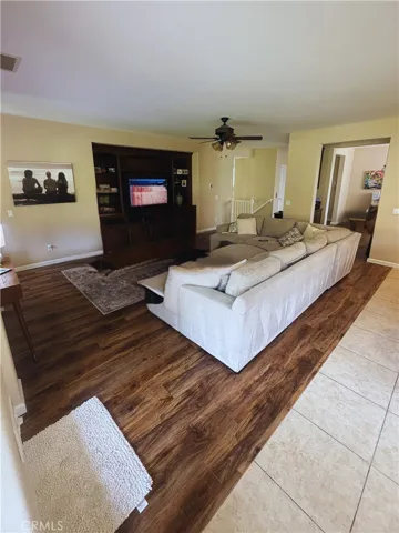Living room - Image digitally enhanced with AI to remove the seller's personal items for privacy.