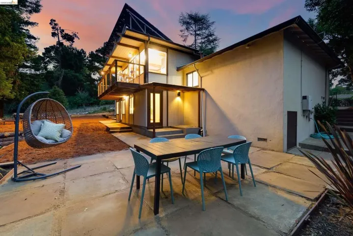 Modern exterior with a distinctive A-frame roofline and multi-level design
