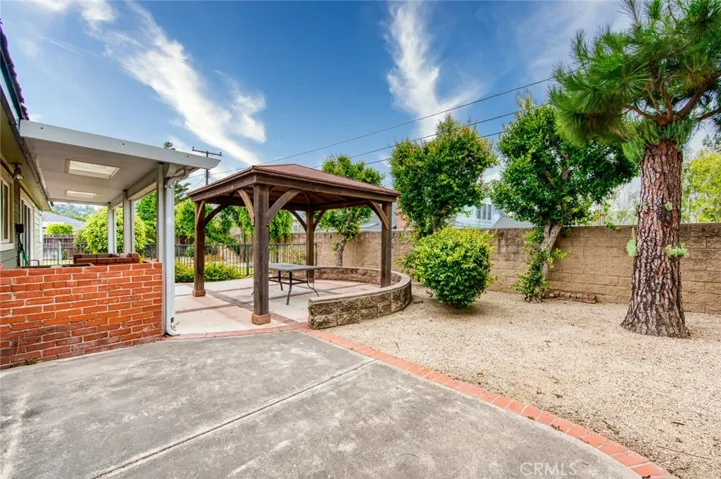 Step outside to discover an expansive backyard with endless possibilities. Whether you envision weekend barbecues, outdoor entertaining, lush gardens, a sparkling pool, or your own private retreat, this oversized 10,000 square foot lot provides the space to bring your ideas to life.