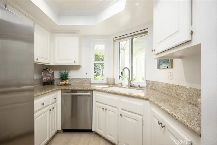 Kitchen is Light & Bright Includes Lots of Counter Space & Granite Counters