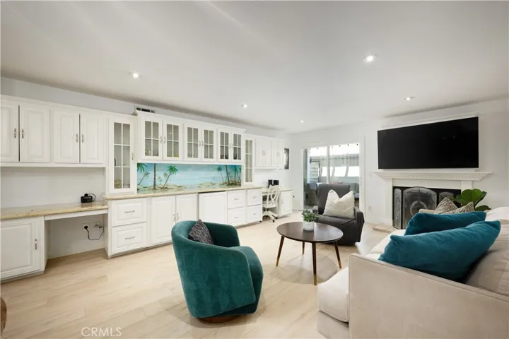 Light Bright & Airy Living with Walkout to Private Patio & Cozy Fireplace