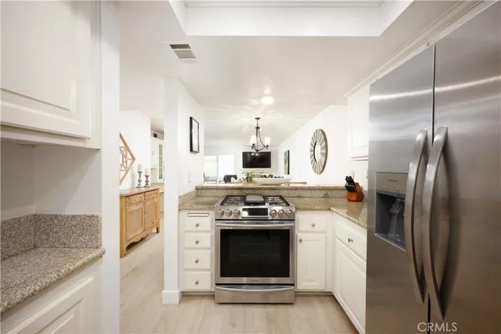 Kitchen is Light & Bright Includes Lots of Counter Space & Granite Counters