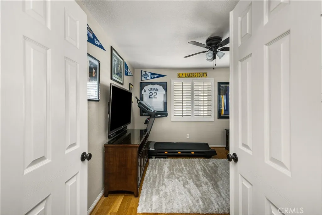 Secondary bedroom (4) with double doors. Currently used as a game room.