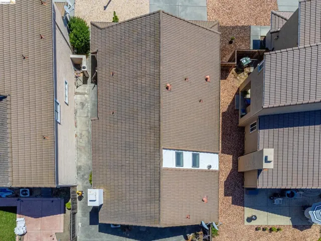 Tile roof with multiple skylights and roof vents