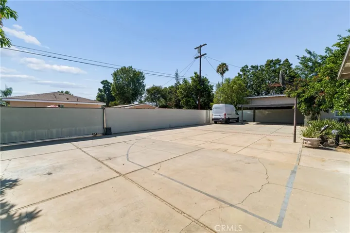 Gated Large Parking Area and Additional Carport