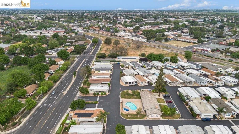 Aerial overview of property's location featuring nearby suburban area Aerial overview of property's location featuring nearby suburban area