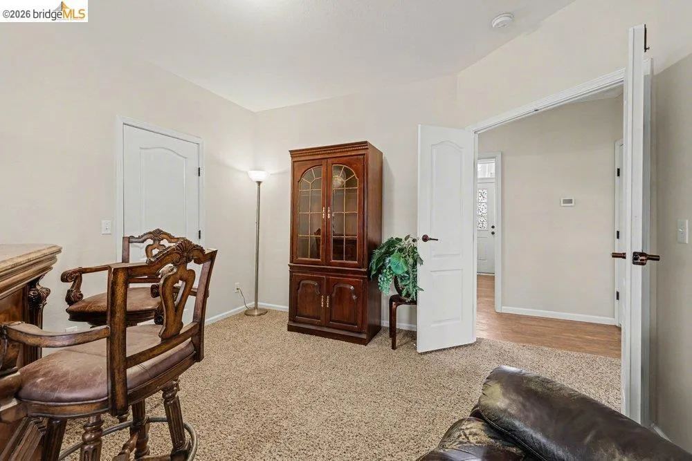 Office featuring light colored carpet and baseboards Office featuring light colored carpet and baseboards