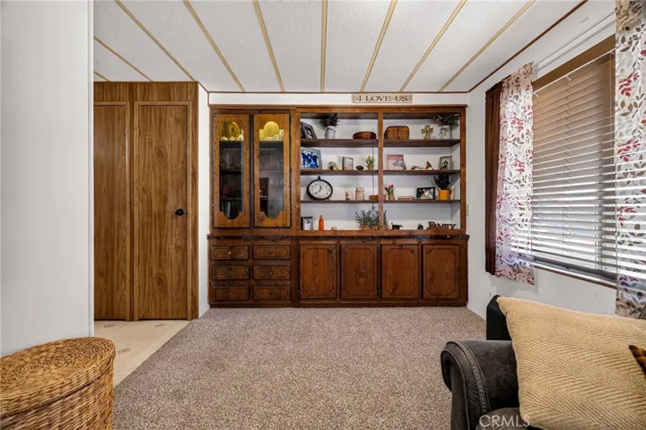 Built in hutch as well a full length double door pantry