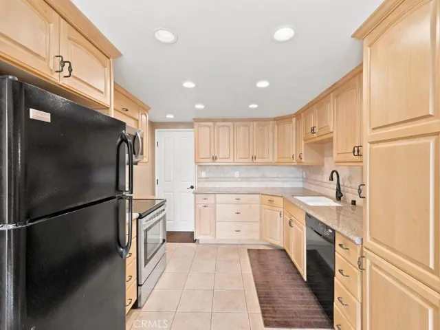 Kitchen has direct access to garage