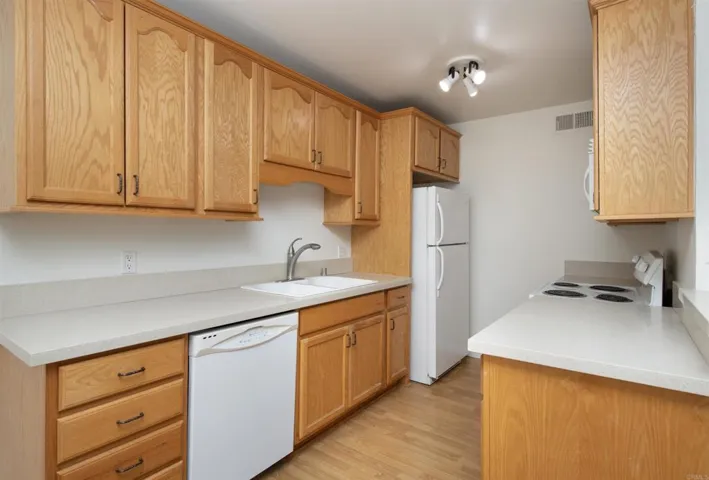 Includes dishwasher, electric stove/oven, microwave, refrigeraor and garbage disposal