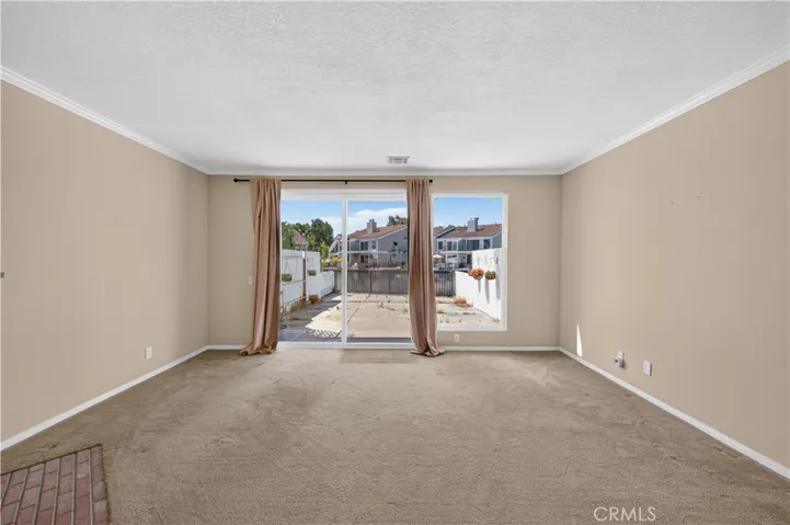 Ample sized back patio leads to the lagoon.