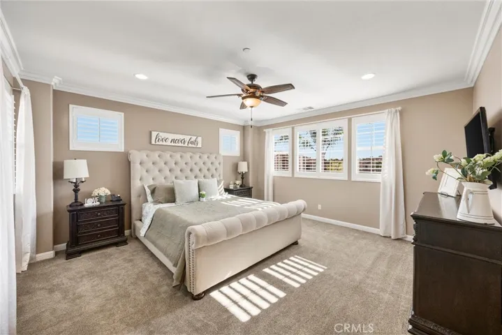Primary suite with dual closets.
